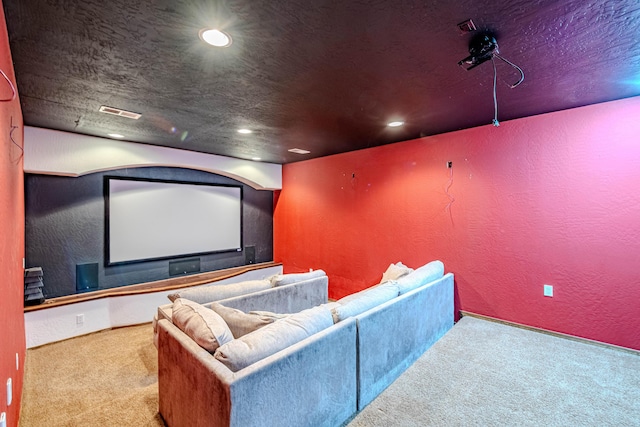 5016 Frontier Rd NE, Rio Rancho, NM 87144 - home theater room with a textured wall, carpet flooring, and recessed lighting