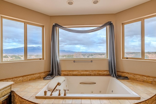 5016 Frontier Rd NE, Rio Rancho, NM 87144 - full bath featuring a wealth of natural light and a tub with jets