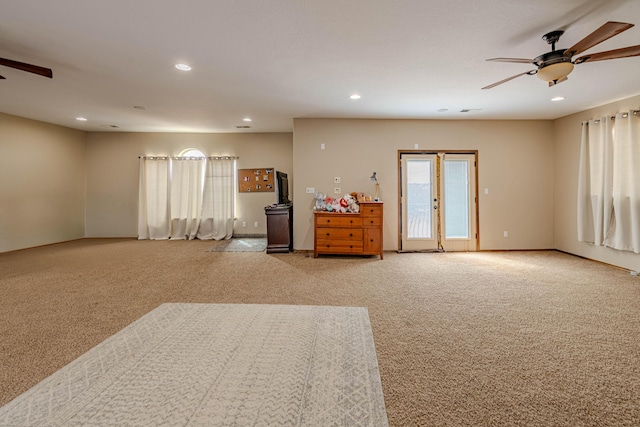 5016 Frontier Rd NE, Rio Rancho, NM 87144 - spare room with light carpet, a ceiling fan, and recessed lighting