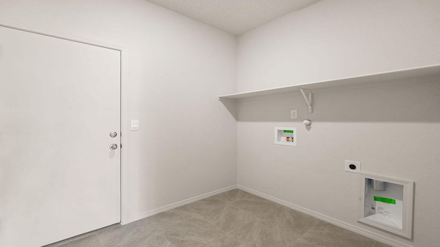 washroom featuring laundry area, baseboards, hookup for a washing machine, gas dryer hookup, and hookup for an electric dryer