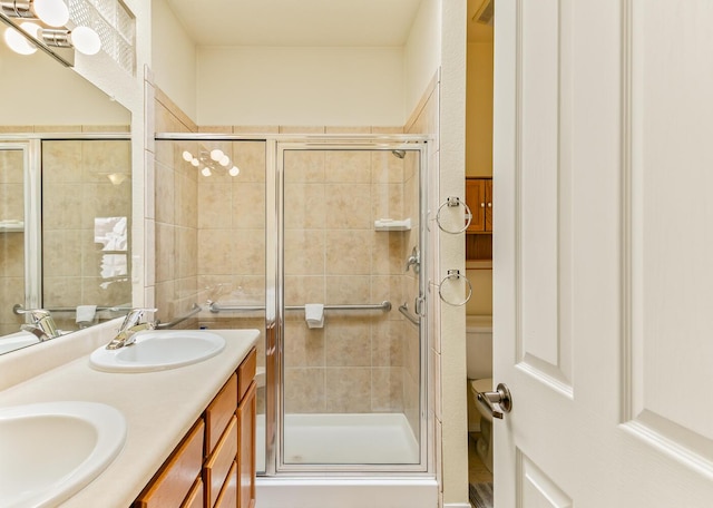 4449 Sunflower Ct SE, Rio Rancho, NM 87124 - bathroom featuring a shower stall and double vanity