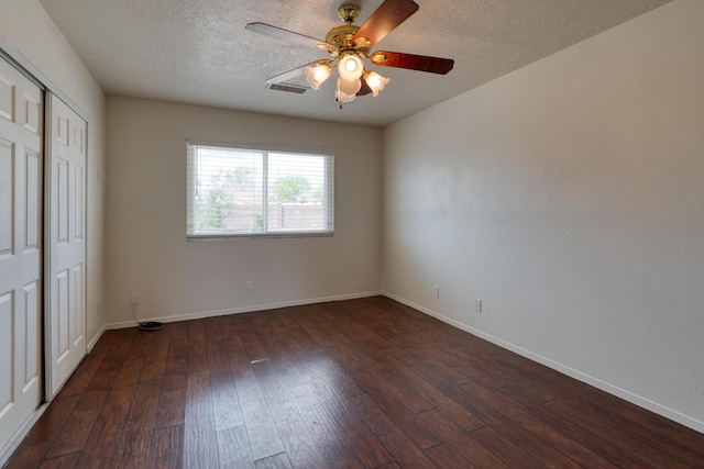 2028 Clearwater Loop NE, Rio Rancho, NM 87144 - unfurnished bedroom featuring hardwood / wood-style flooring, a closet, baseboards, a textured ceiling, and ceiling fan