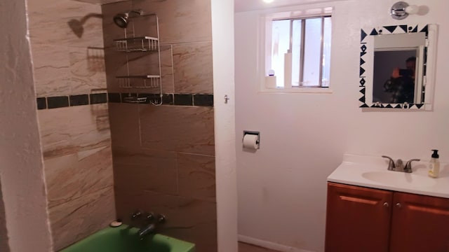 full bathroom featuring vanity and bathtub / shower combination
