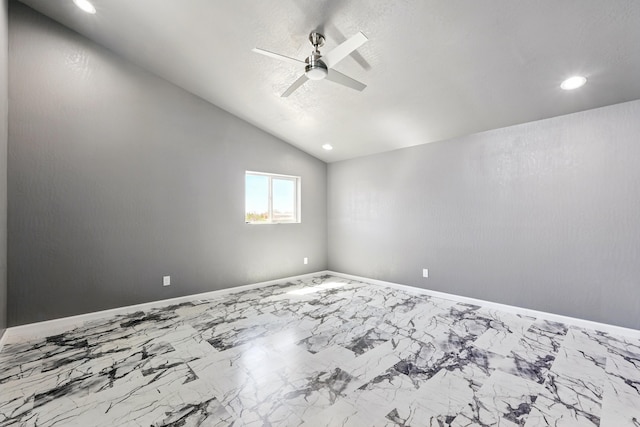 empty room with vaulted ceiling, baseboards, recessed lighting, a ceiling fan, and marble finish floor