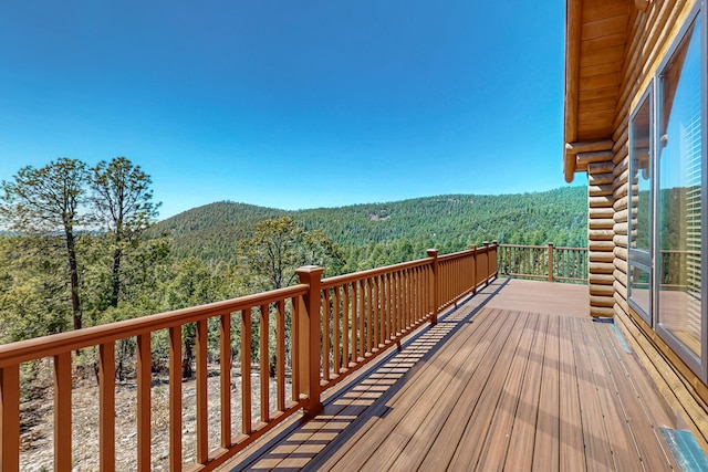 387 County Rd B64, Pecos, NM 87552 - wooden deck with a view of trees and a mountain view