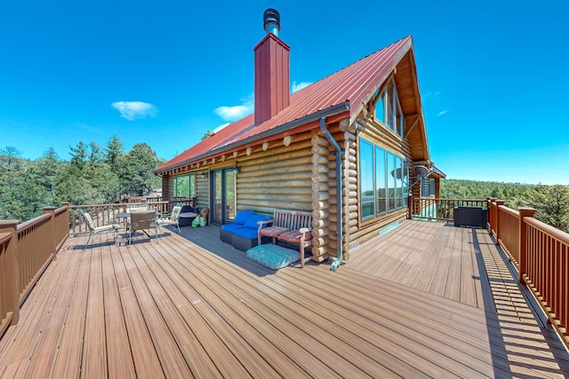387 County Rd B64, Pecos, NM 87552 - wooden terrace featuring outdoor dining area