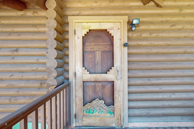 387 County Rd B64, Pecos, NM 87552 - doorway to property with log siding