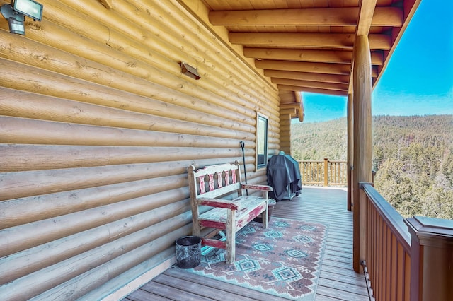 387 County Rd B64, Pecos, NM 87552 - deck featuring a wooded view and a mountain view