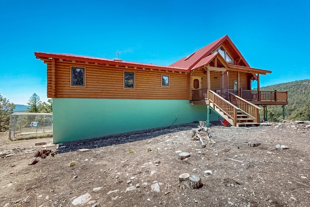 387 County Rd B64, Pecos, NM 87552 - log home with log exterior and metal roof