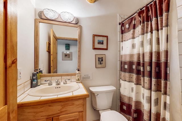 387 County Rd B64, Pecos, NM 87552 - full bathroom with toilet, vanity, and a shower with curtain