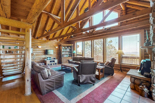 387 County Rd B64, Pecos, NM 87552 - living room with wooden ceiling, rustic walls, beamed ceiling, and high vaulted ceiling