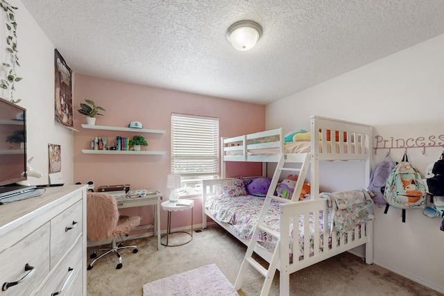 7105 Napoleon Rd NE, Rio Rancho, NM 87144 - bedroom featuring light colored carpet, an office area, a textured ceiling, and baseboards