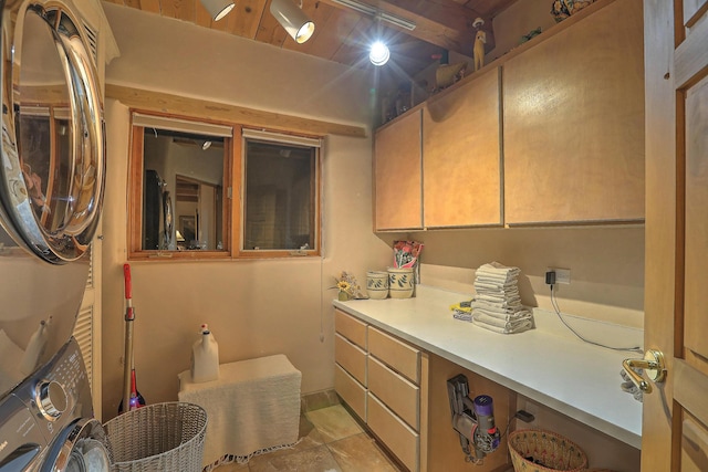 253 Spring Creek Pl NE, Albuquerque, NM 87122 - laundry area featuring cabinet space and stacked washing machine and dryer