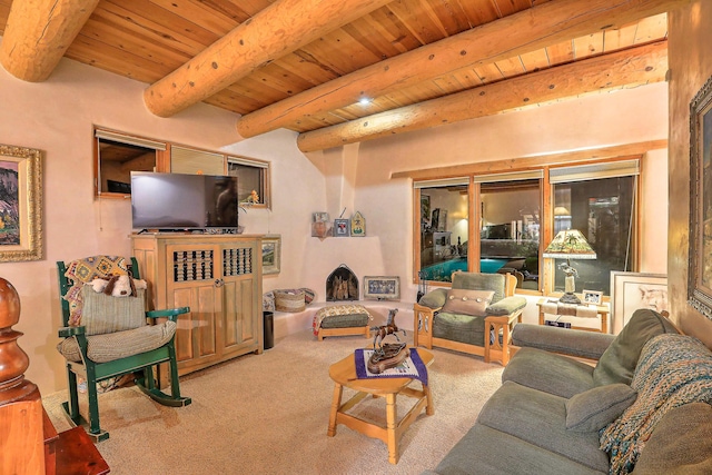 living area with wooden ceiling, carpet flooring, and beam ceiling
