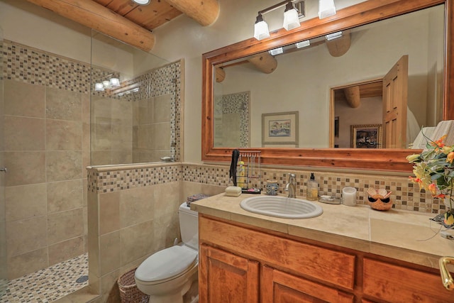 253 Spring Creek Pl NE, Albuquerque, NM 87122 - full bathroom featuring a walk in shower, toilet, tile walls, vanity, and beamed ceiling