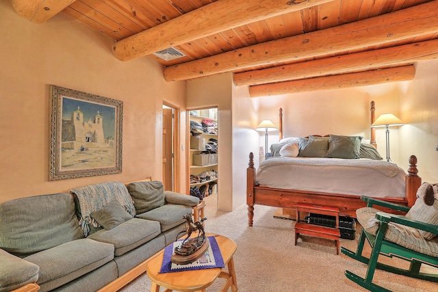 bedroom featuring beam ceiling, wooden ceiling, visible vents, and carpet