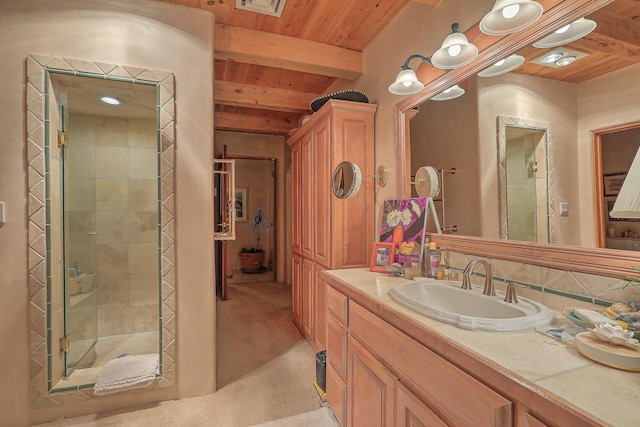 253 Spring Creek Pl NE, Albuquerque, NM 87122 - bathroom featuring vanity, wooden ceiling with exposed beams, and a stall shower