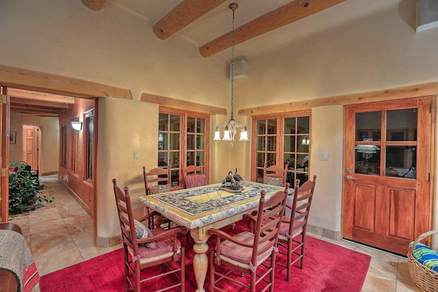 dining room featuring beamed ceiling, a towering ceiling, and a notable chandelier
