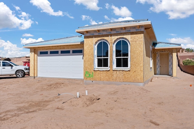1561 Corta Corona, Los Lunas, NM 87031 - view of front of property featuring driveway and a garage