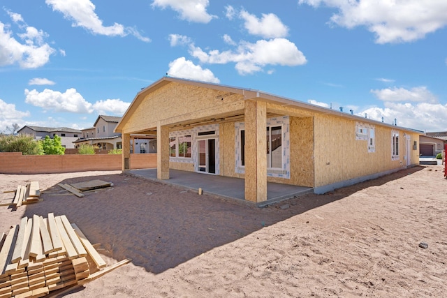 1561 Corta Corona, Los Lunas, NM 87031 - back of property featuring a patio and fence