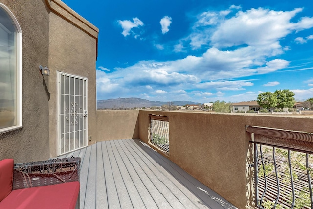 3404 Lockerbie Dr SE, Rio Rancho, NM 87124 - wooden terrace featuring a mountain view