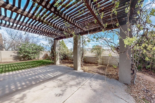 3404 Lockerbie Dr SE, Rio Rancho, NM 87124 - view of patio / terrace featuring a pergola and a fenced backyard