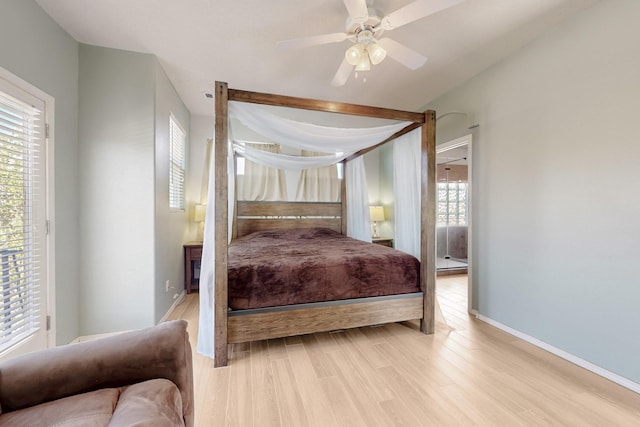 3404 Lockerbie Dr SE, Rio Rancho, NM 87124 - bedroom featuring light wood-type flooring, a ceiling fan, and baseboards