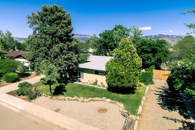 birds eye view of property featuring a mountain view