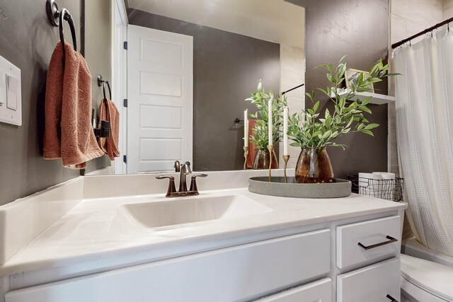 full bathroom featuring shower / bath combo and vanity