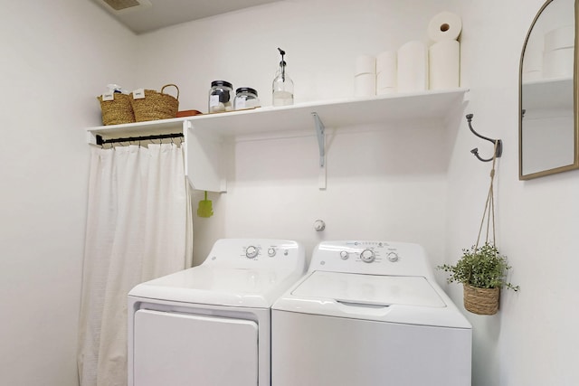 laundry area with washer and dryer and laundry area