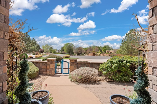 view of patio / terrace featuring fence private yard and a gate