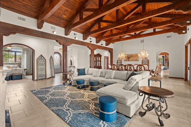 living area with arched walkways, high vaulted ceiling, visible vents, and wood ceiling
