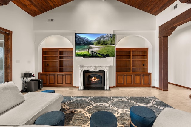 living room with wood ceiling, a premium fireplace, tile patterned flooring, and high vaulted ceiling