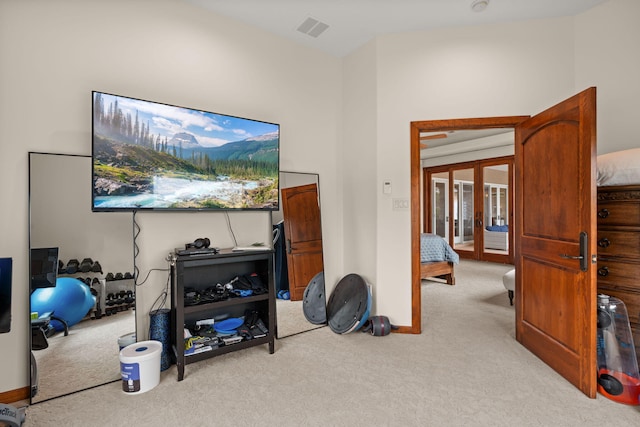 interior space featuring baseboards, french doors, and visible vents