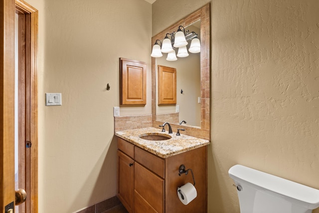 5720 Rio Lama Rd NE, Rio Rancho, NM 87144 - bathroom with vanity and toilet