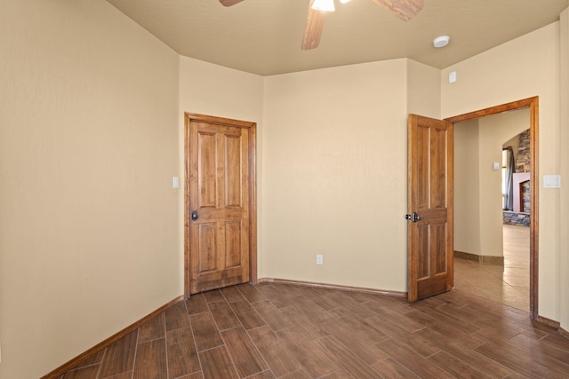 5720 Rio Lama Rd NE, Rio Rancho, NM 87144 - empty room with baseboards, a ceiling fan, and wood finish floors