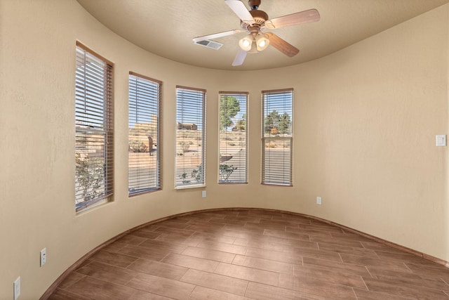 5720 Rio Lama Rd NE, Rio Rancho, NM 87144 - unfurnished room featuring visible vents and a ceiling fan