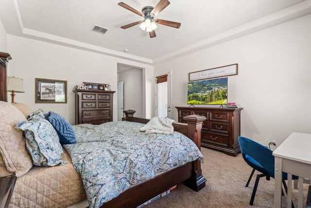 4024 Colina Roja Ln NE, Rio Rancho, NM 87124 - bedroom with light colored carpet and a ceiling fan
