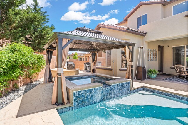 4024 Colina Roja Ln NE, Rio Rancho, NM 87124 - view of swimming pool with an in-ground hot tub, a gazebo, a fenced backyard, and a patio area