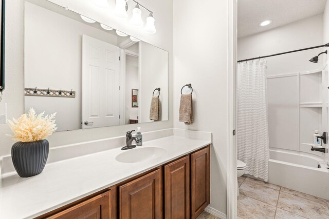 4024 Colina Roja Ln NE, Rio Rancho, NM 87124 - bathroom with vanity, toilet, shower / bath combo, and recessed lighting