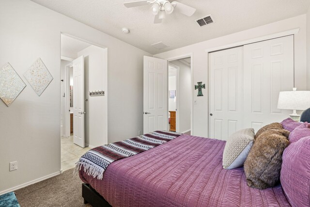 4024 Colina Roja Ln NE, Rio Rancho, NM 87124 - bedroom with a closet, carpet floors, a ceiling fan, and baseboards