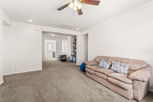 4024 Colina Roja Ln NE, Rio Rancho, NM 87124 - carpeted living area featuring ceiling fan, recessed lighting, and baseboards