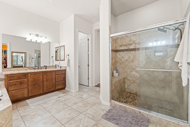 4024 Colina Roja Ln NE, Rio Rancho, NM 87124 - full bathroom with vanity, a shower stall, and baseboards
