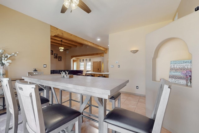 dining space featuring light tile patterned floors, baseboards, and ceiling fan