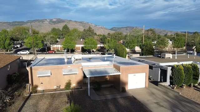 exterior space featuring a mountain view