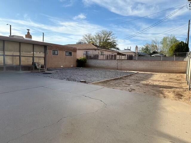 back of property with fence