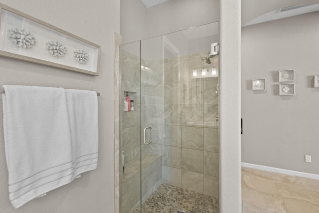 12209 Bear Valley Ln NW, Albuquerque, NM 87120 - bathroom with baseboards and a stall shower