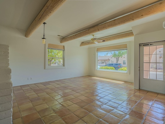7417 Maplewood Dr NW, Albuquerque, NM 87120 - spare room featuring beamed ceiling, tile patterned flooring, and ceiling fan