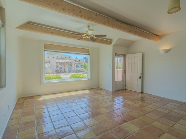 7417 Maplewood Dr NW, Albuquerque, NM 87120 - spare room featuring tile patterned floors, ceiling fan, and lofted ceiling with beams