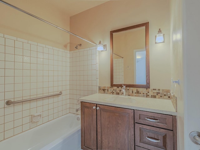 7417 Maplewood Dr NW, Albuquerque, NM 87120 - bathroom with decorative backsplash, vanity, and shower / bath combination